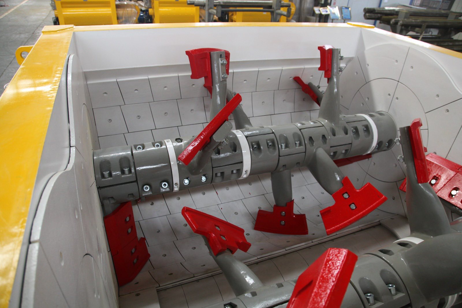 how does a twin shaft concrete mixer work